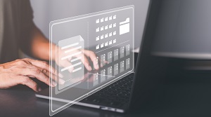 hands on the keyboard of notebook with icons of folders